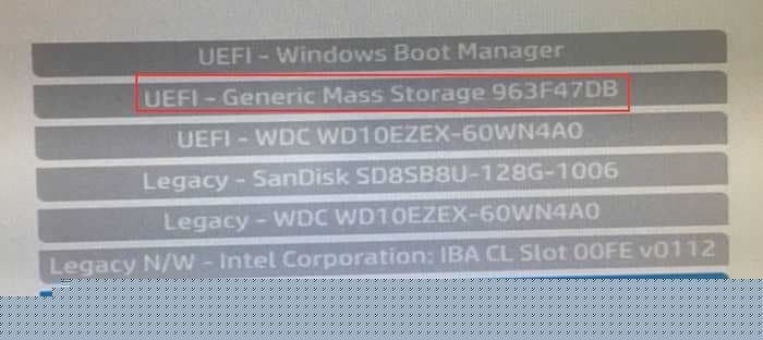 开机按ESC，按F9然后选择U盘启动